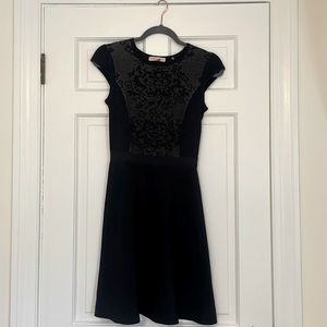 Flattering Rebecca Taylor midi dress with frontal lace pattern detail.